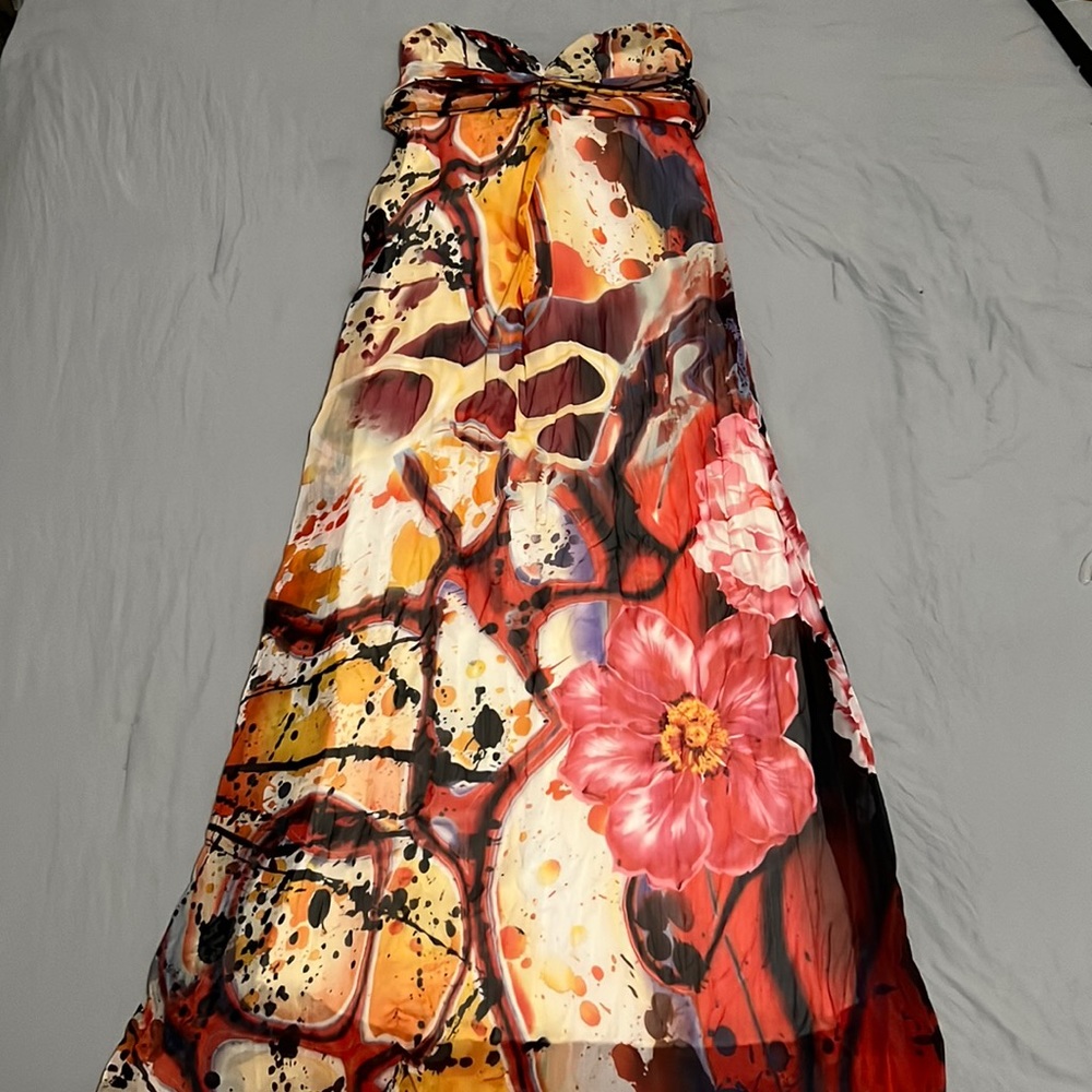Small, Strapless Multi colored pattern with Red, black, blue, and yellow.